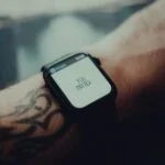 smartwatch modern on wrist showing health stats